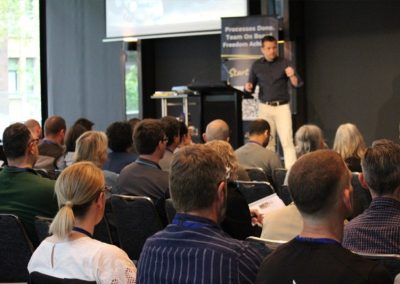 David Jenyns presenting at a live event